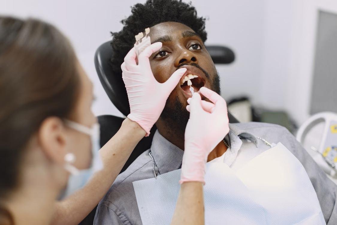 a man getting a dental checkup.