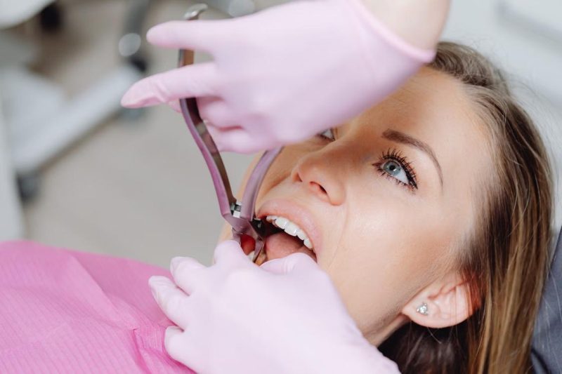 woman getting dental treatment.